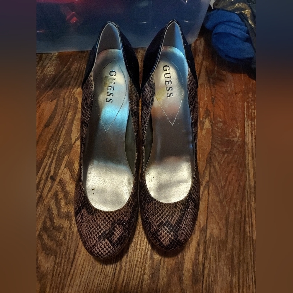 Cute sexy Guess heels.  Black and brownish snake skin pattern with a rounded toe